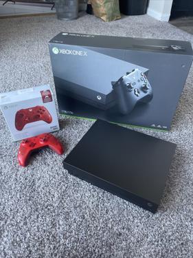 Public product photo - 
Microsoft Xbox One X Console - 1TB, Black. Gaming console is like new. Comes with power cord, wireless controller with 2 rechargeable controller batteries.

Brand: Microsoft
Type: Controller	
Platform: Microsoft Xbox One
Color: Black	
Model: Xbox One X
Connectivity: HDMI
Features: Blu-Ray Compatible, Internet Browsing, Wi-Fi Capability, 3D Audio Technology	
Storage Capacity: 1 TB
Resolution: 4K (UHD)
